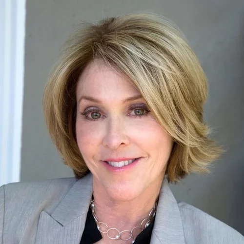 an image of Dr. Blacher, a white woman, on a gray background