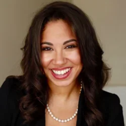 Woman with black hair smiling