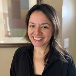 Woman smiling with black shirt