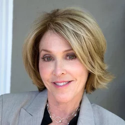 an image of Dr. Blacher, a white woman, on a gray background